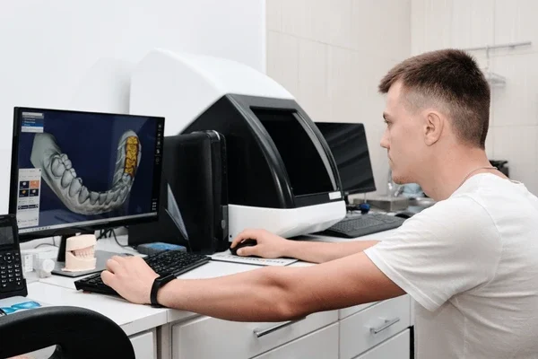 dental-technician-working-computer-laboratory-600nw-2266351525